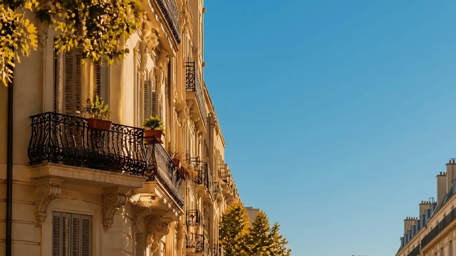 A quiet residential street in central Madrid on a late afternoon